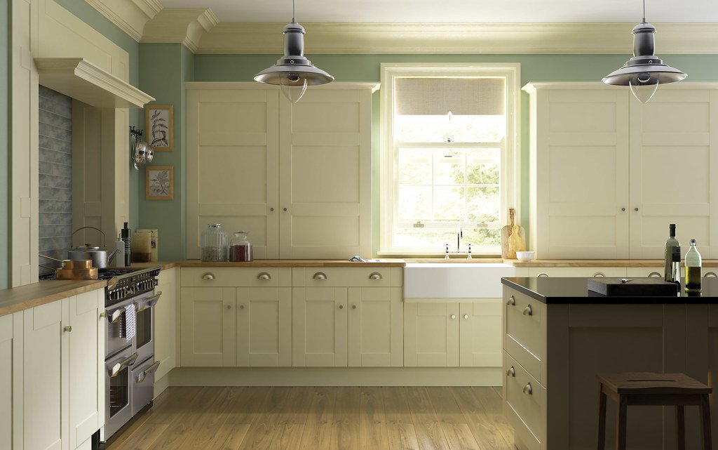 Warm neutral kitchen cabinetry and worktop